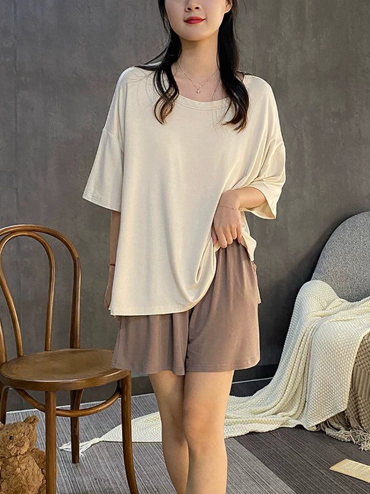 [Sərin hiss] Qadınlar üçün döş yastıqları olan bir parça pijama yay modal nazik seksi qolsuz jilet asma ev geyimi