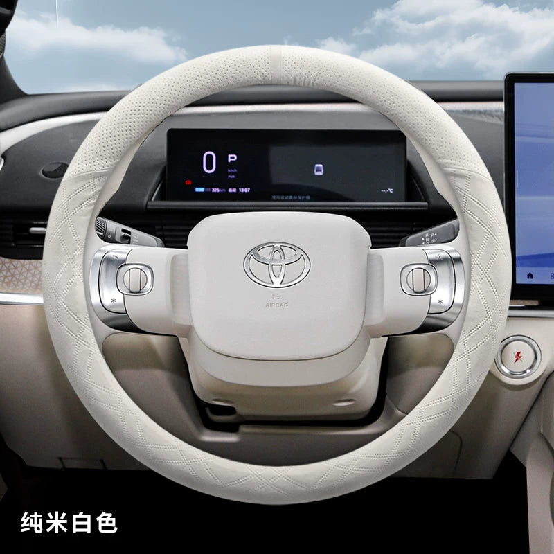 2025 Toyota Corolla üçün sükan örtüyü, zamşa və sürüşməyən, təri udma materialından hazırlanmışdır.