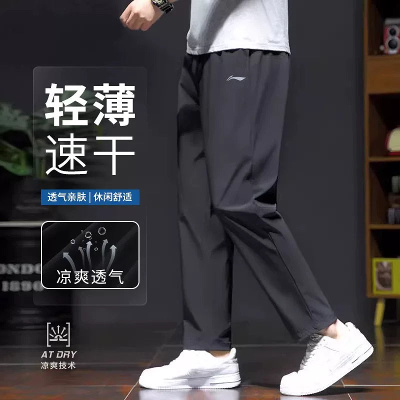 Li Ning tez quruyan idman şalvarı kişi yeni yay nazik kişi buz ipək boş qaçış gündəlik şalvar düz ayaqlı idman şalvarı