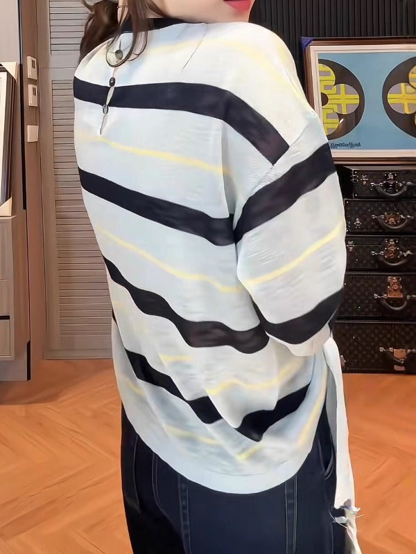 Böyük ölçülü, qalstuklu, uzunqollu, zolaqlı, erkən yaz, arıqlama və boş forma üçün ideal olan, daxili və ya əsas üst geyim kimi ideal olan qadın futbolkası.