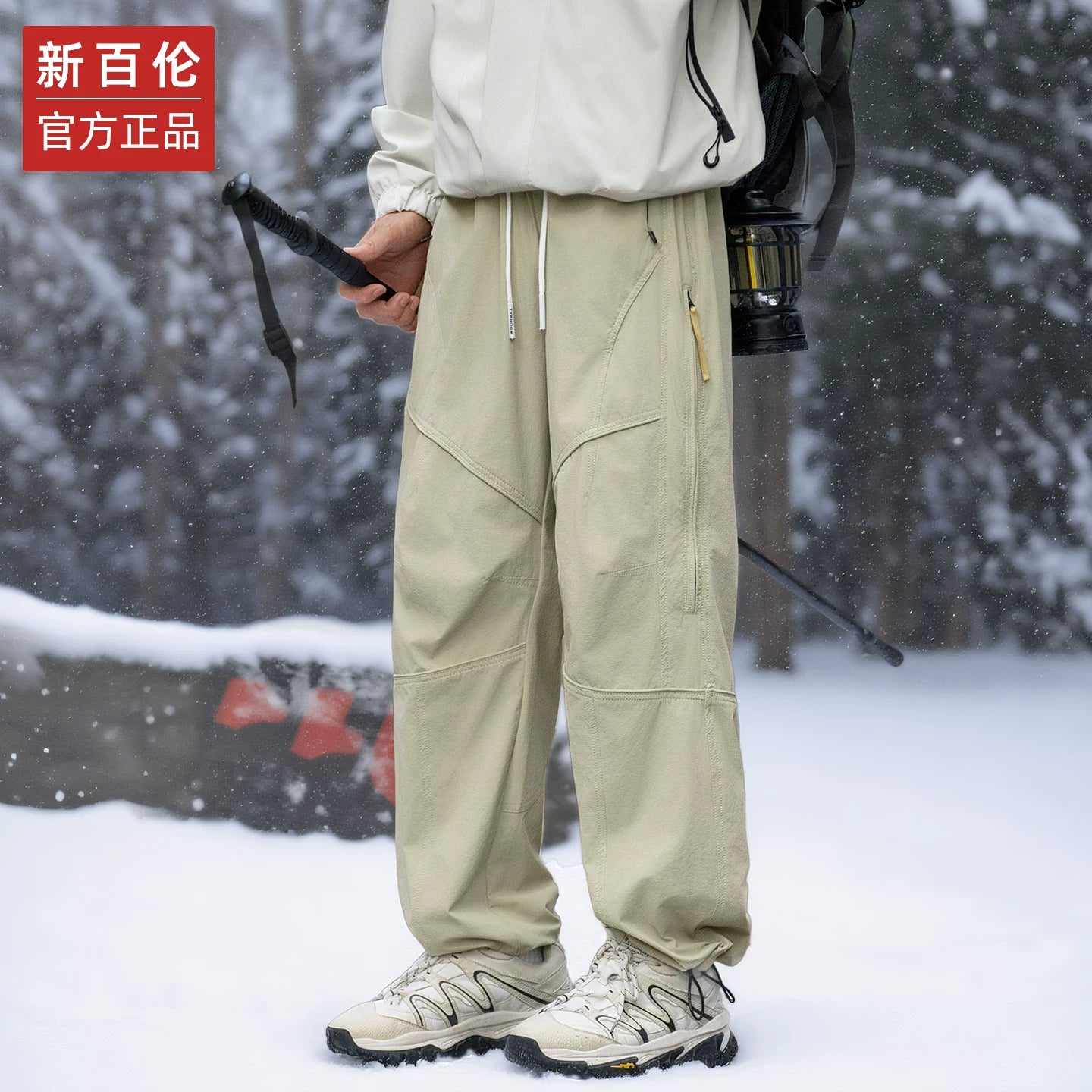 New Balance Amerika üslubunda dəbli kişi gündəlik şalvarları, 2025 payız/qış yeni modası, açıq havada gəzinti və külək keçirməyən şalvarlar, alpinizm iş şalvarları.