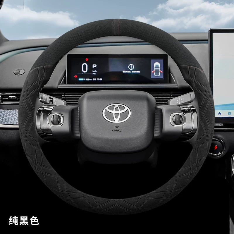 2025 Toyota Corolla üçün sükan örtüyü, zamşa və sürüşməyən, təri udma materialından hazırlanmışdır.