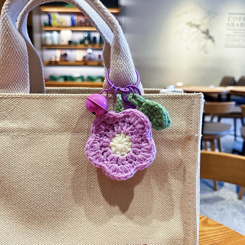 A sweet plush flower keychain with a woven real flower design, perfect as a small gift for couples, bags or Teachers' Day.