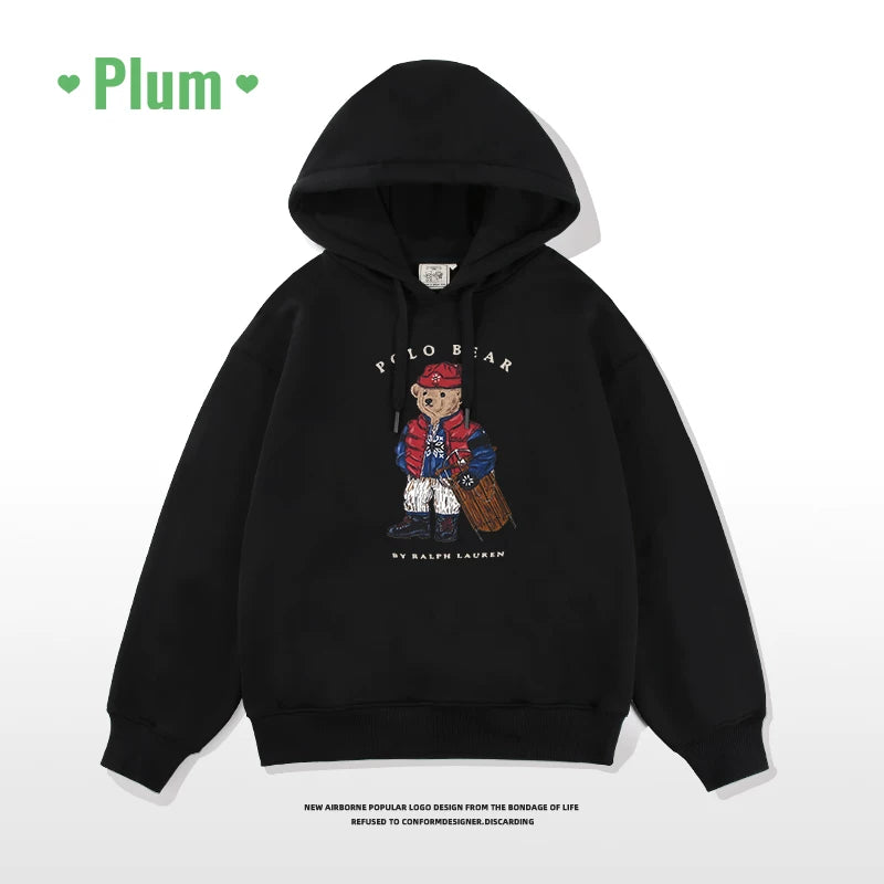 Zhou Yutong-un Amerika retro tünd göy rəngli sviter, qadın 2025-ci il yeni payız və qış stilində, flis astarlı və kiçik ayı naxışı ilə qalınlaşdırılmış.