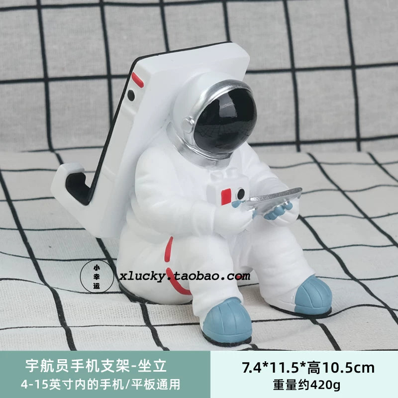 Astronavt mövzulu telefon tutacağı, televizor/iPad/planşet dayağı, masaüstü üçün tənbəllik dəstəyi, yaradıcı bəzək, astronavt hədiyyəsi.