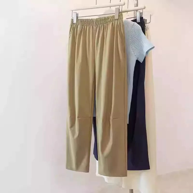 Kiçik armud formalı fiqurlar üçün böyük ölçülü qadınlar üçün 2026 yay yüksək belli düz ayaqlı, tez quruyan qısa hərəm gündəlik şalvarı