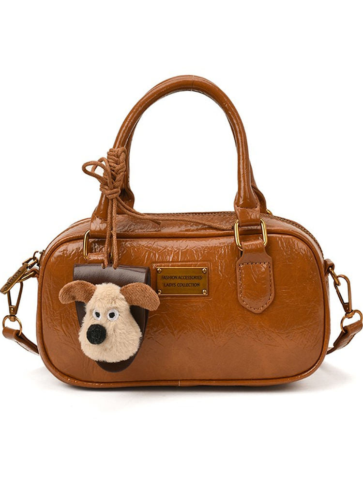 A high-end fashion niche Korean-style bag for 2025, elegant and versatile, can be worn over the shoulder, crossbody, in hand, or under the arm.