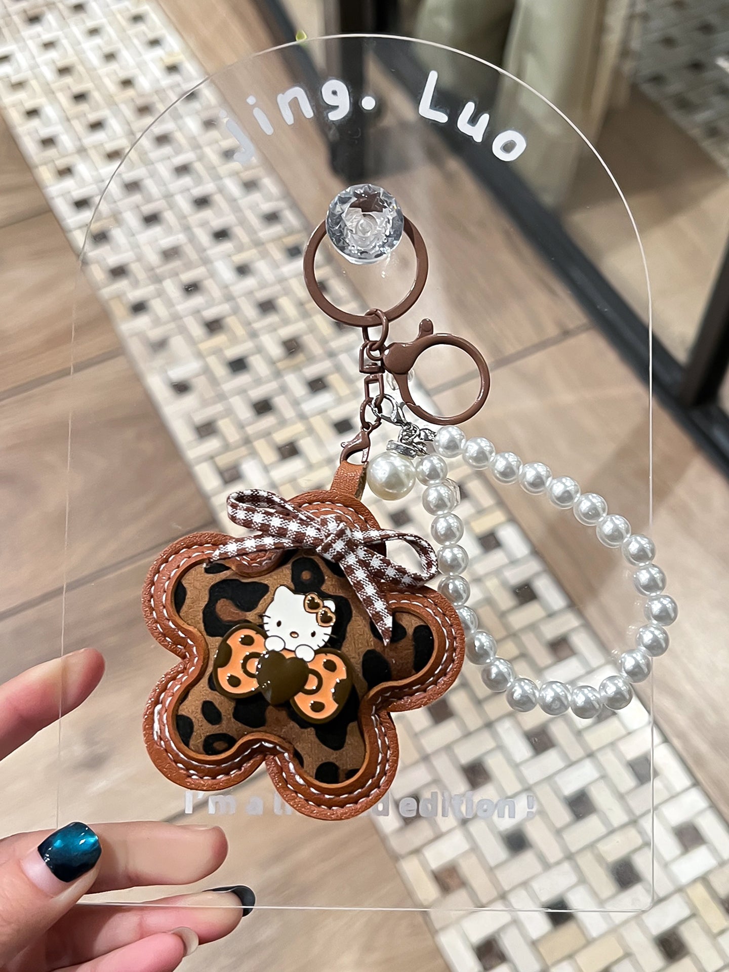 Leopard print Hello Kitty key chain, leather beaded, cute couple pendant, 2026 new Hello Kitty jewelry for women.