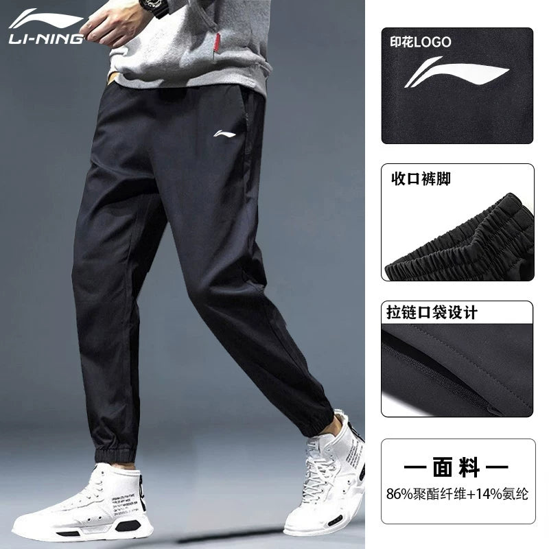 Li Ning tez quruyan kişi idman şalvarı yeni buz ipəkdən nəfəs alan ayaq biləyi uzunluğunda şalvar fitnes qaçış idman şalvarı toxunmuş şalvar