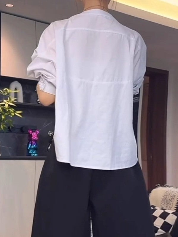 Qadınlar üçün böyük ölçülü, şık qara köynək, 2026-cı ilin yazının əvvəlləri üçün yeni model, geniş formalı, arıqladıcı, uzunqol köynək.