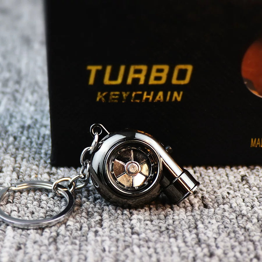 Audible TURBO car key ring, electric LED lights, turbine blade rotating key with pendant, creative decoration.