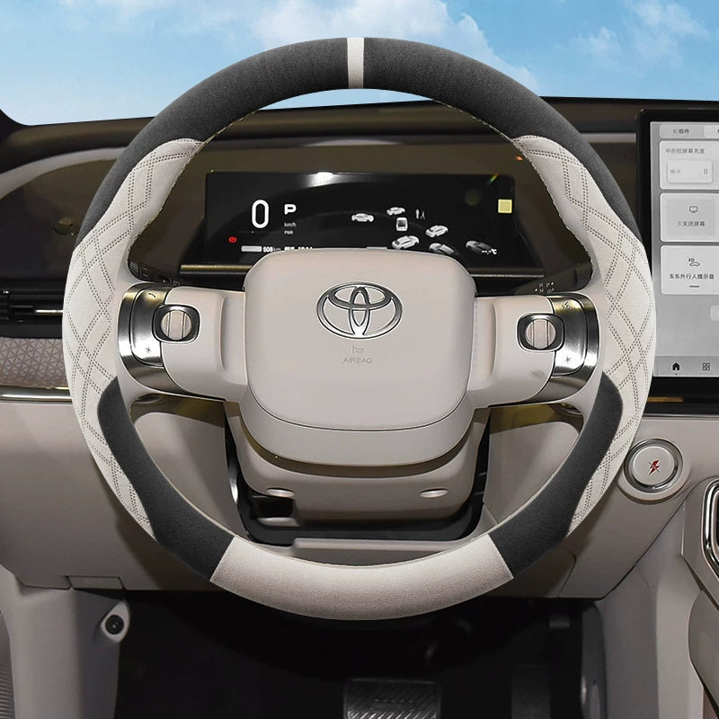 2025 Toyota Corolla üçün sükan örtüyü, zamşa və sürüşməyən, təri udma materialından hazırlanmışdır.