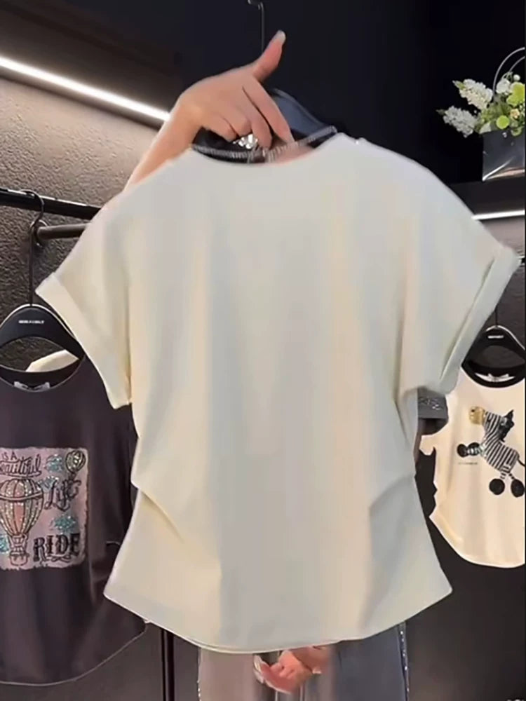 Bir az kök qadınlar üçün böyük ölçülü yay arıqladıcı, belini sıxan qısaqol köynək. Çin üslubunda düyünlü düymələri olan unikal dizayn.