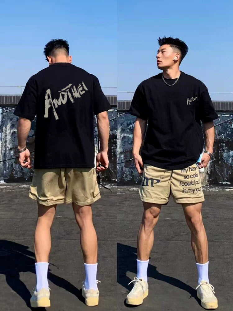 Avropa və Amerika üslublu yaraşıqlı yüksək səviyyəli ingilis qısaqol kişi köynəyi ağır pambıq təsadüfi moda brend cütün üst yarımqol yayı