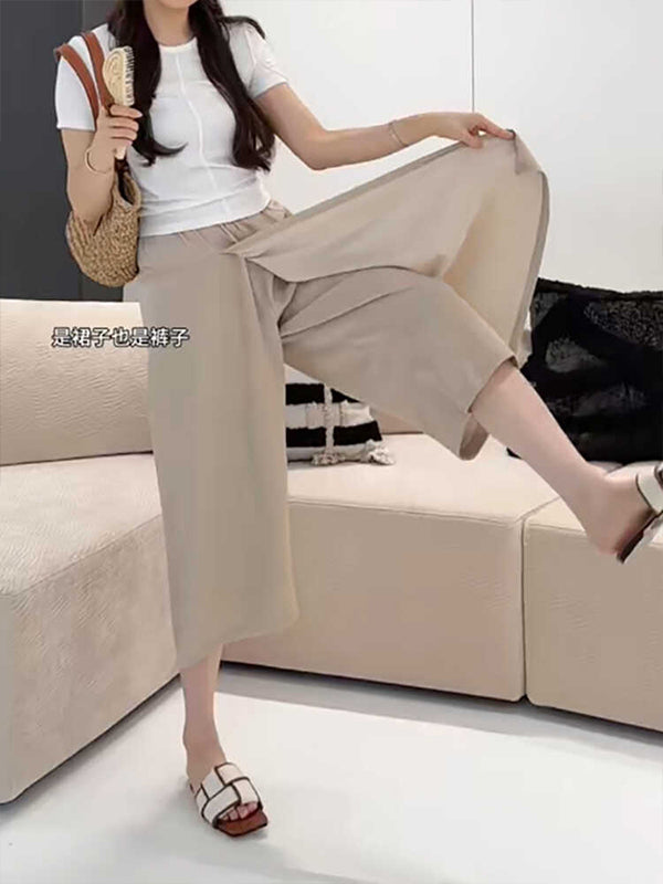 2026-cı ilin yayı üçün qadın üçün axıcı, yüngül midi ətək, böyük ölçüdə, boş formada, gündəlik, yüksək belli, qısa enli şalvar.