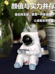 Astronavt mövzulu telefon tutacağı, televizor/iPad/planşet dayağı, masaüstü üçün tənbəllik dəstəyi, yaradıcı bəzək, astronavt hədiyyəsi.