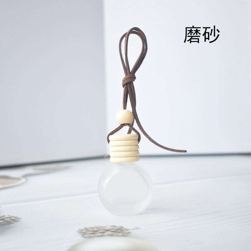 Yüksək səviyyəli Avtomobil Aromaterapiya Yanğınsöndürmə Şüşələri Öz-özünə quraşdırılmış Ətir Alt Butulkaları Avtomobil Asma Ornament Efir Yağı Uçucu Aroma Diffuzoru Qalıcı Ətir