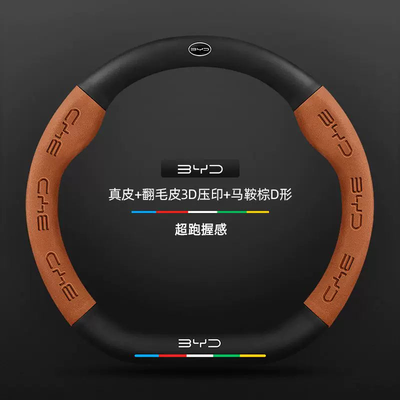 Honkonqda sağ sükanlı BYD ATTO2 avtomobilləri üçün uyğundur. Bütün fəsillər üçün orijinal dəri sükan örtüyü. Aksesuarlar və modifikasiya.