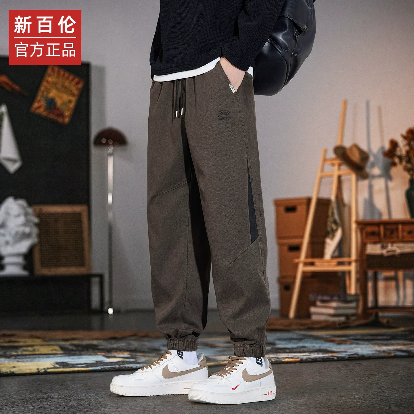 New Balance kişilər üçün Amerika üslublu hərəm cins şalvarı, 2025 payız/qış yeni moda, dəbli boş forma, daralmış ayaq, idman gündəlik şalvar.