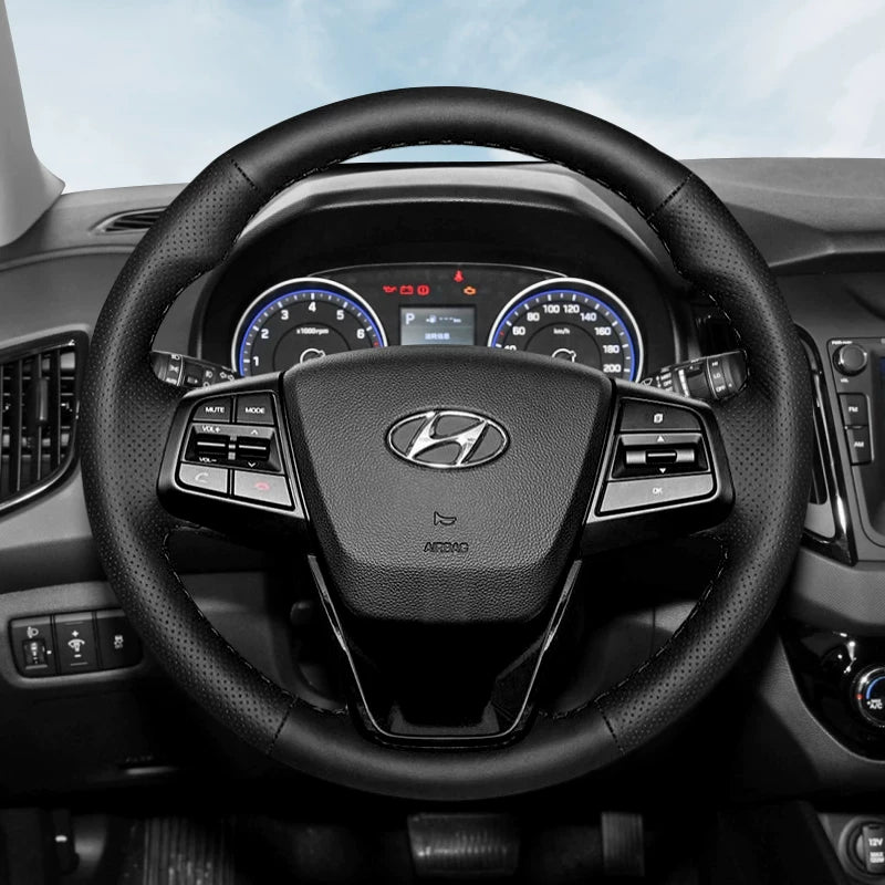 Hyundai Elantra, Hyundai Mistra, Hyundai Yuedong, Tucson və Langdong ix35 üçün qış versiyası üçün əl ilə tikilmiş orijinal dəri sükan örtüyü.