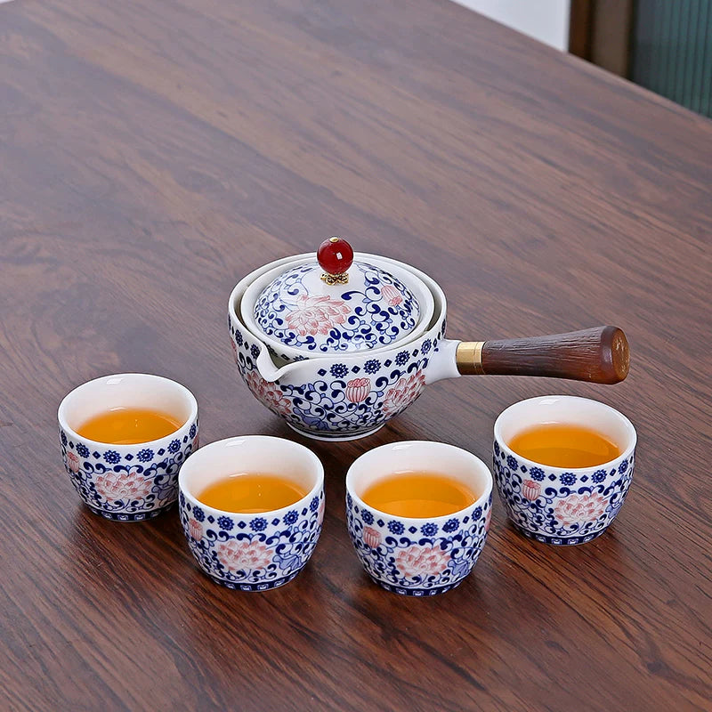Fırlanan Xiaoyao çaydanı Xiaokang avtomatik çay dəsti çay hazırlamaq üçün xüsusi yeni üslubda yan tutacaq çaydanı ev istifadəsi üçün səyahət dəsti