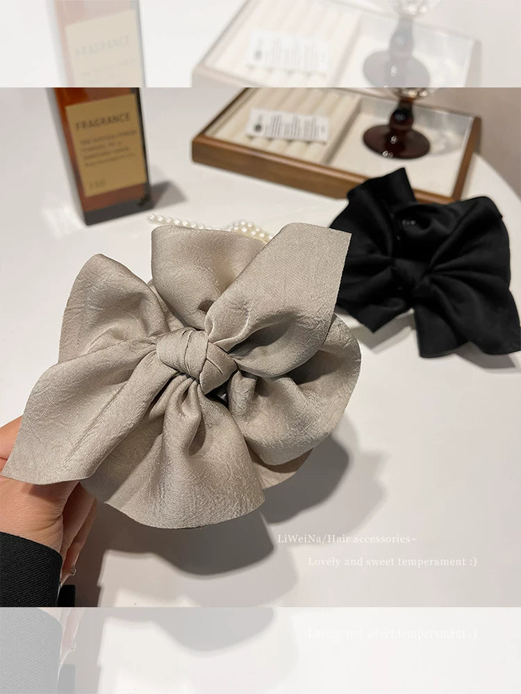 Tam saç həcmi ilə başın arxası üçün fransız xasiyyətli yay düyünlü grabber saç sancısı 2025 yeni yüksək səviyyəli saç sancısı