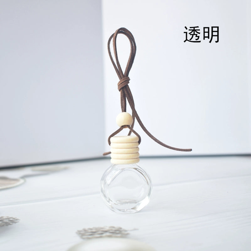 Yüksək səviyyəli Avtomobil Aromaterapiya Yanğınsöndürmə Şüşələri Öz-özünə quraşdırılmış Ətir Alt Butulkaları Avtomobil Asma Ornament Efir Yağı Uçucu Aroma Diffuzoru Qalıcı Ətir