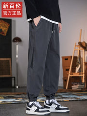 New Balance kişilər üçün Amerika üslublu hərəm cins şalvarı, 2025 payız/qış yeni moda, dəbli boş forma, daralmış ayaq, idman gündəlik şalvar.