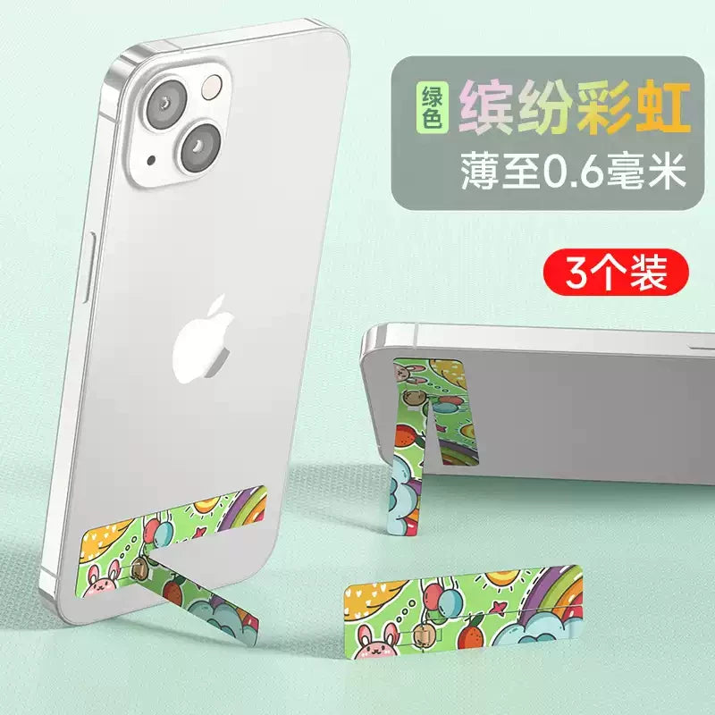 Yapışqanlı arxalığı, görünməz metalı olan yaradıcı masaüstü telefon dayağı, möhkəm, ultra nazik, çoxfunksiyalı, qatlanan, portativ, istifadəsi asan, yeni stil, şirin cizgi filmi cütlük dayağı, kişilər və qadınlar üçün mini üzük tutacağı.