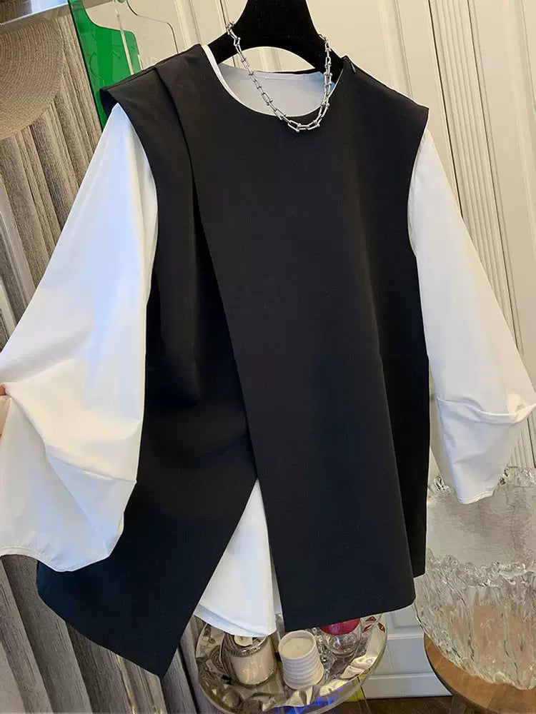 A classy, ​​stylish, versatile and elegant black suit vest shirt set, perfect for layering in the spring of 2025.