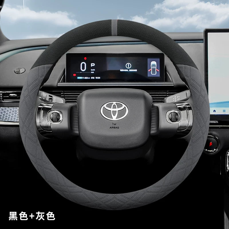 2025 Toyota Corolla üçün sükan örtüyü, zamşa və sürüşməyən, təri udma materialından hazırlanmışdır.