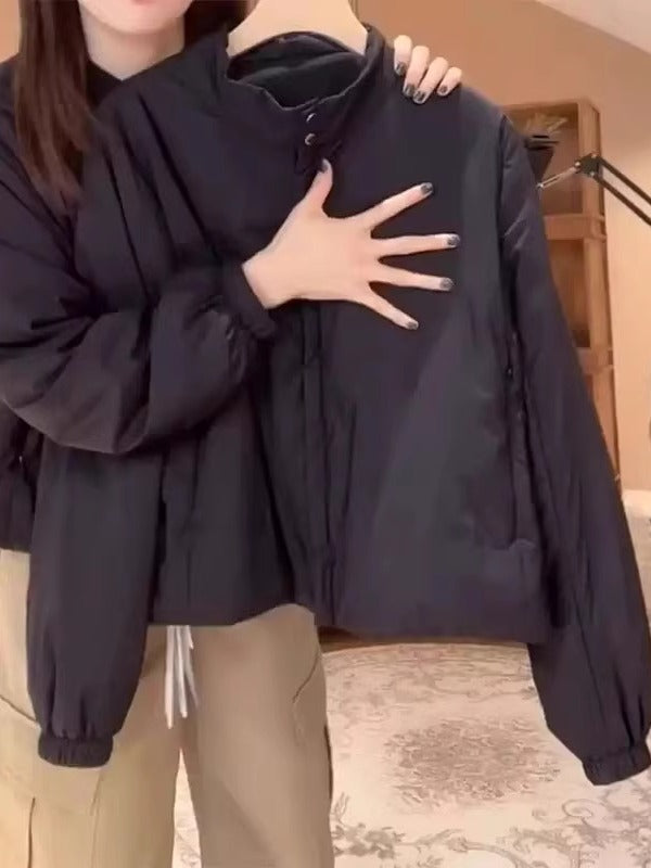 Qara rəngli, qadın yaxalı pambıq gödəkçə, payız və qış, böyük ölçüdə, geniş formada, sadə, çoxfunksiyalı, gündəlik uzunqol köynək.