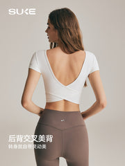 SUKE cross beauty bel idman qısaqol qadın belini arıqlayan və arıqlayan yoqa köynəyi yay Pilates fitnes köynəyi döş yastığı ilə