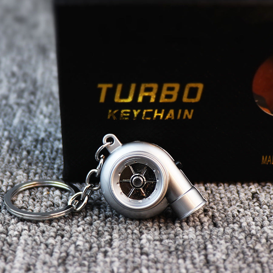 Audible TURBO car key ring, electric LED lights, turbine blade rotating key with pendant, creative decoration.