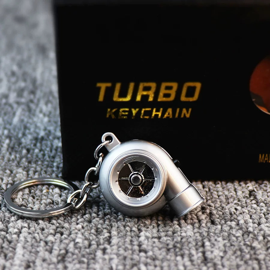 Audible TURBO car key ring, electric LED lights, turbine blade rotating key with pendant, creative decoration.
