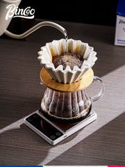 Bincoo əllə dəmlənmiş qəhvə filtr kağızı V60 tort qabı filtr kağızı asma qulaq qəhvə filtri çantası universal dəyirmi 100 ədəd