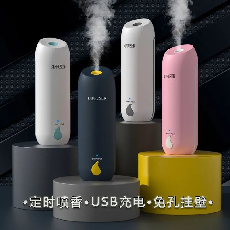 Aromaterapiya maşını məişət ətir maşını vanna otağı tualeti USB ilə doldurulmuş avtomatik sprey dezodorasiya uzunmüddətli ətir maşını