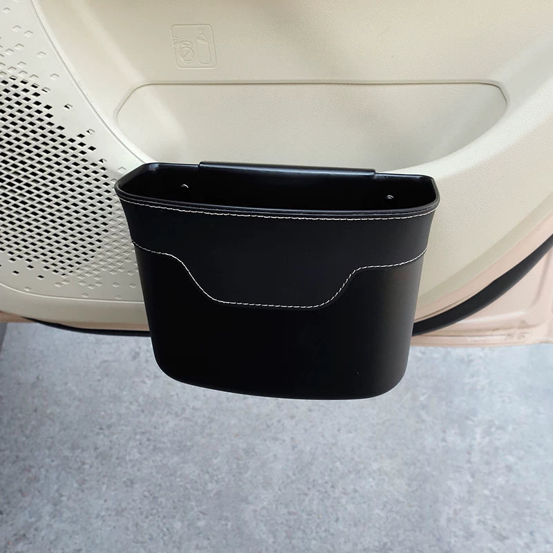 Car trash can, side door storage, interior premium feature seat back multi-function storage umbrella holder