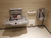 Ruiwo divara quraşdırılmış uşaq baxımı masası uşaq bezi dəyişdirmə masası alış-veriş mərkəzləri və hava limanları üçün qatlanan vanna otağı uşaq kreslosu