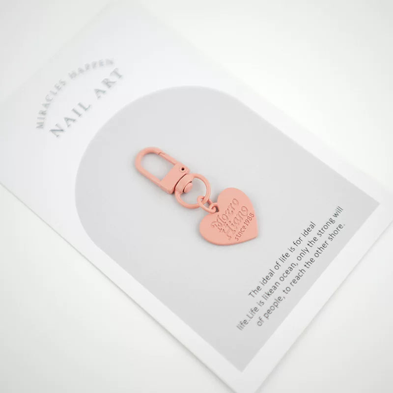 Ürək formalı kulon, konfet rəngli şarf, AirPods metal açar zənciri, Koreya hərfli qulaqcıqlar, çantalar üçün ürək formalı aksessuarlar.