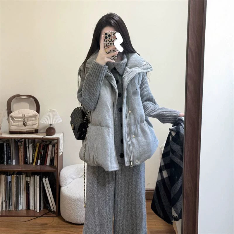 A sleek and lazy three-piece set in Korean style: a stand-up collar vest, a collared cardigan, and gray wide-leg pants.
