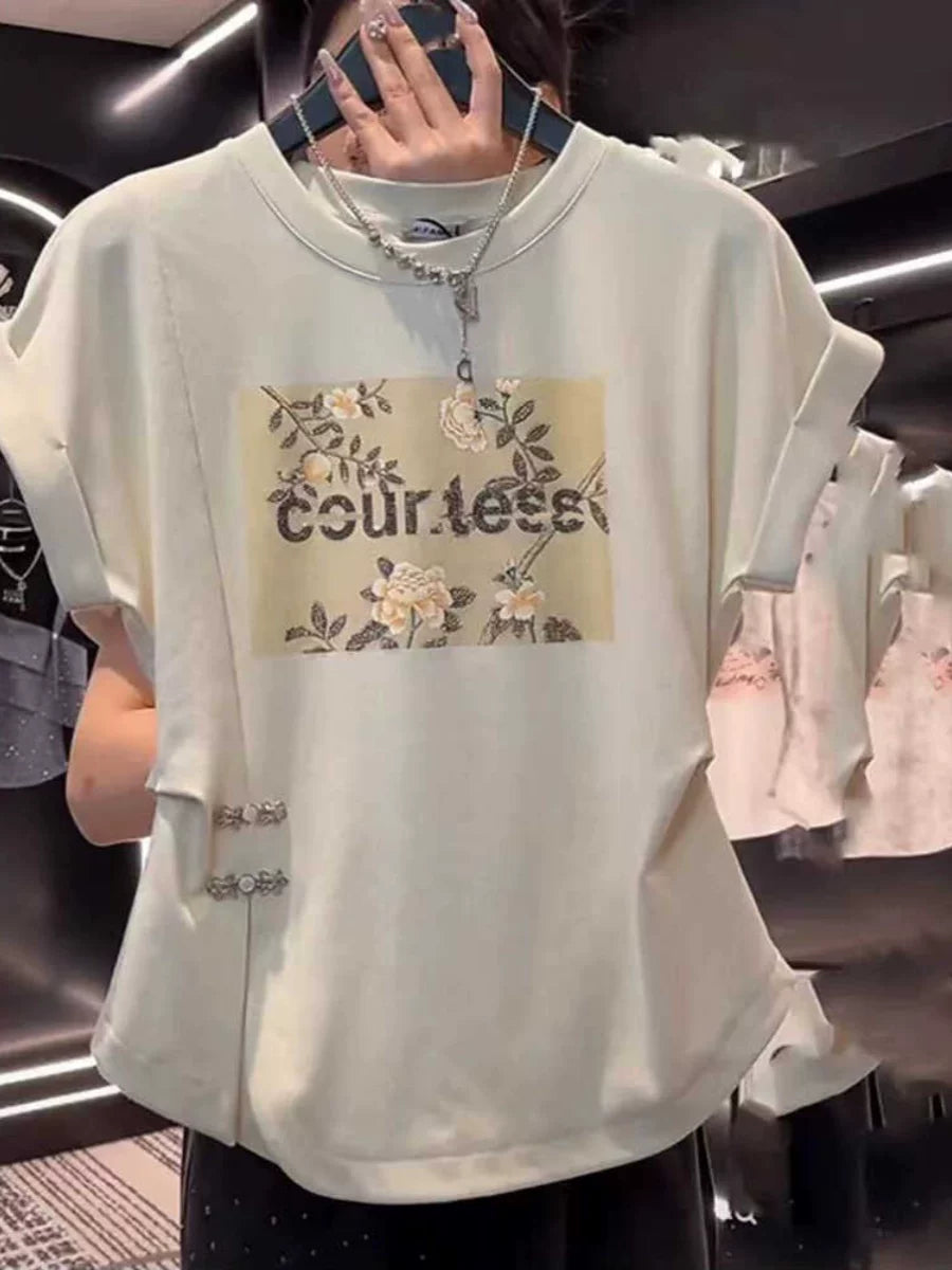 Bir az kök qadınlar üçün böyük ölçülü yay arıqladıcı, belini sıxan qısaqol köynək. Çin üslubunda düyünlü düymələri olan unikal dizayn.