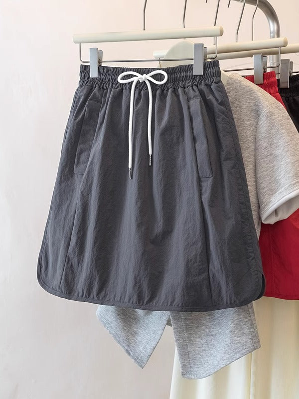 Qadınlar üçün Böyük Ölçülü Şirin və Sərin Yüksək Belli A-xəttli Ətək, 2026 Yeni Yay Modeli, Böyük Ölçülü Armud Formalı Fiqurlar üçün Arıqladıcı Yük Ətəyi