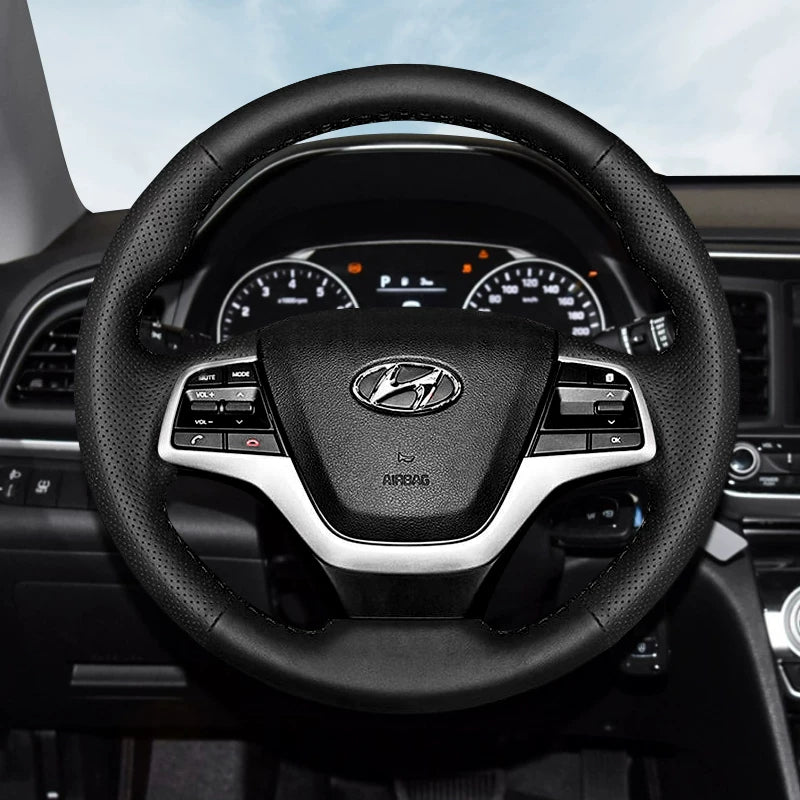 Hyundai Elantra, Hyundai Mistra, Hyundai Yuedong, Tucson və Langdong ix35 üçün qış versiyası üçün əl ilə tikilmiş orijinal dəri sükan örtüyü.