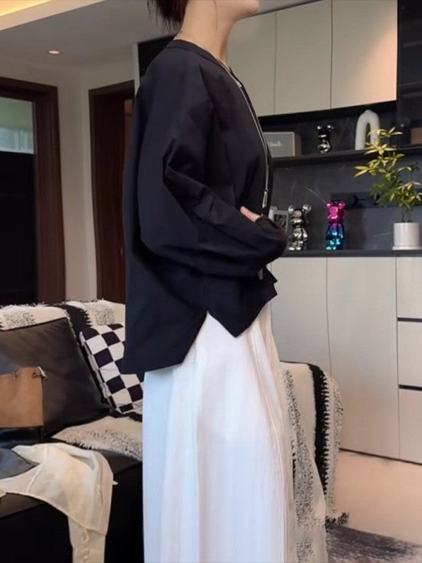 Qadınlar üçün böyük ölçülü, şık qara köynək, 2026-cı ilin yazının əvvəlləri üçün yeni model, geniş formalı, arıqladıcı, uzunqol köynək.