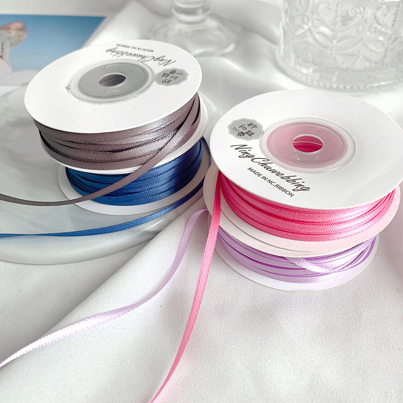 0,3 sm şifrəli iki tərəfli polyester lent toy yayı yüksək səviyyəli hədiyyə qablaşdırma ipək lent 3 mm nazik lent