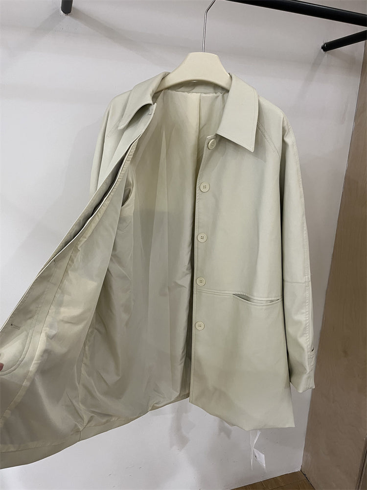 Koreya yüksək keyfiyyətli POLO Dongdaemun qadın üçün orta uzunluqlu krem dəri palto, yeni yaz üslubunda, yumşaq protein dəri xəndək palto.