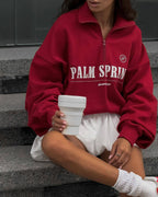 Avropa və Amerika üslubunda boş hərf printli yarım fermuarlı sviter