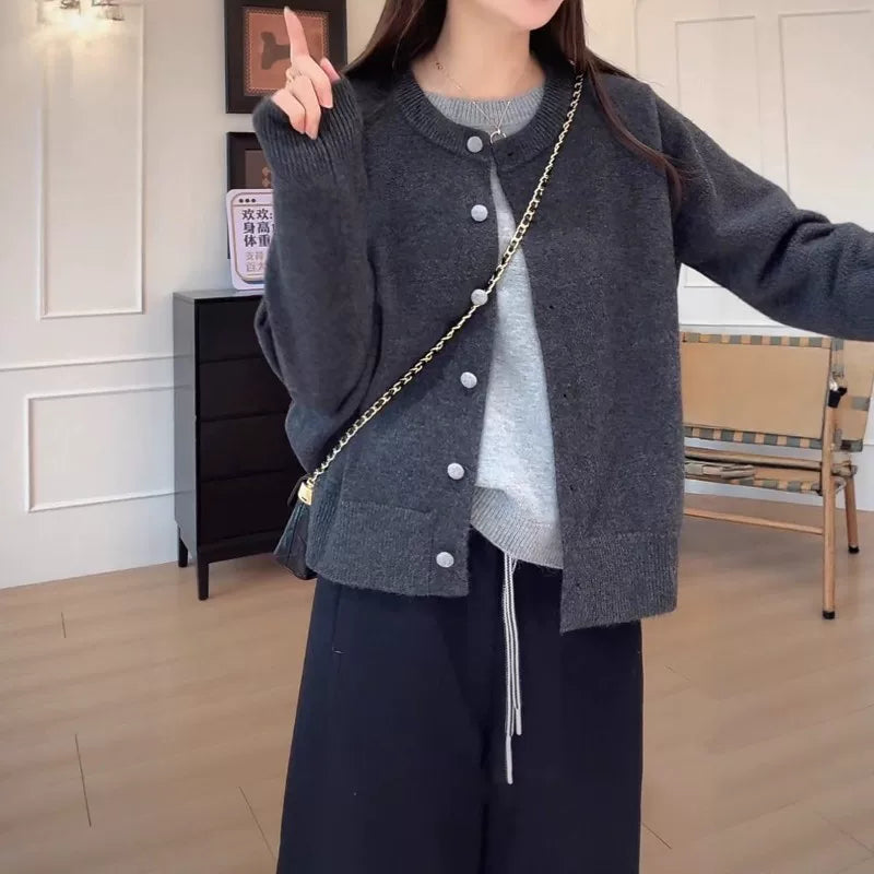 Korean style color-blocked faux two-piece knit women's cardigan, new fall style, oversized, button-up, slimming, loose sweater top.