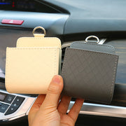 Car storage box, car air vents, leather multi-function pocket for mobile phones, cigarettes, coins, cards and drinks.
